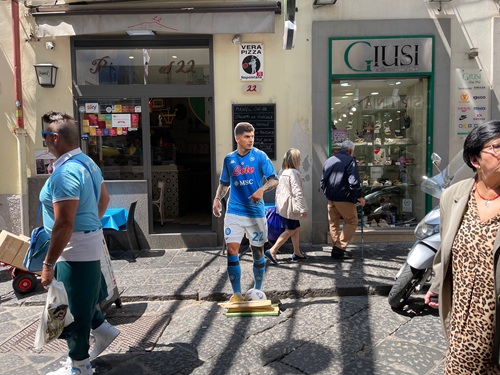 Pignasecca Market in Naples with traditional stalls and local shops