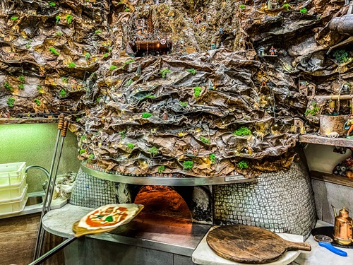 Traditional wood-fired pizza oven in the Pignasecca area of Naples
